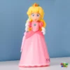 Muñeca Princesa Peach (30 cm) - The Super Mario Bros. Movie (JAKKS Pacific)